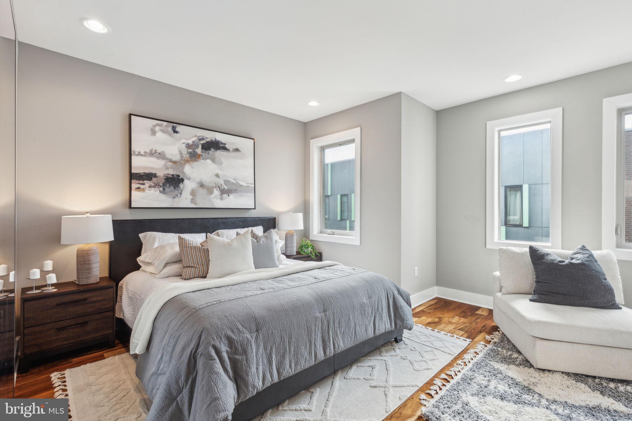 832 North 3rd Street, Unit 7 Philadelphia, PA 19123 - Photo 43 of 52 a spacious bedroom with a bed and a couch