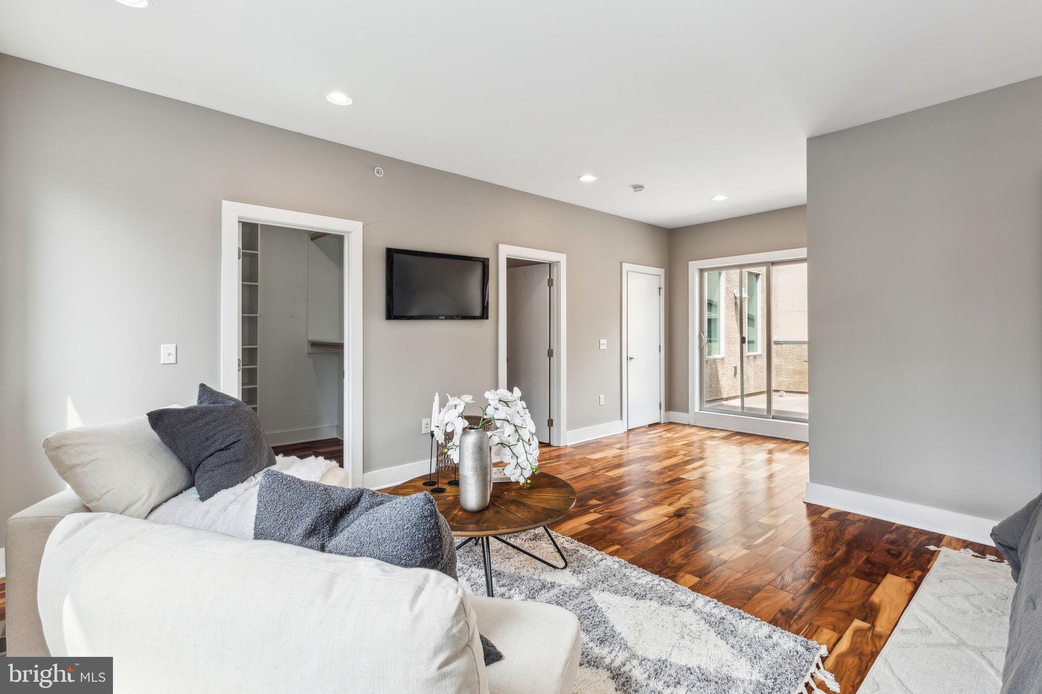 832 North 3rd Street, Unit 7 Philadelphia, PA 19123 - Photo 45 of 52 a living room with furniture and a large window