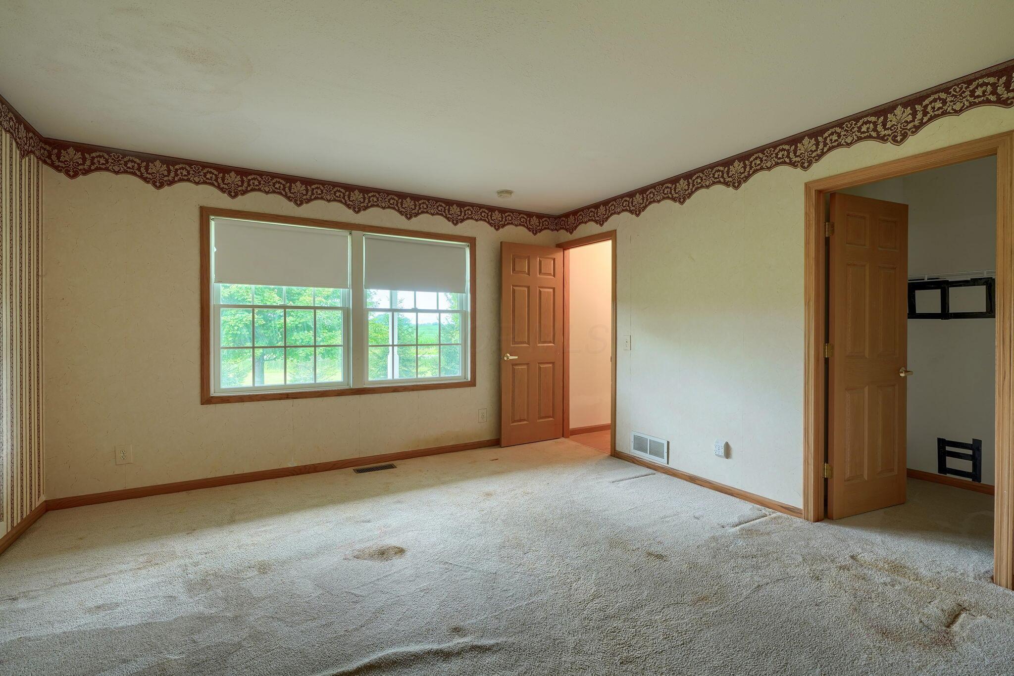 4600 Winchester Southern Road Circleville, OH 43113 - Photo 25 of 64 master bedroom with walk in closet