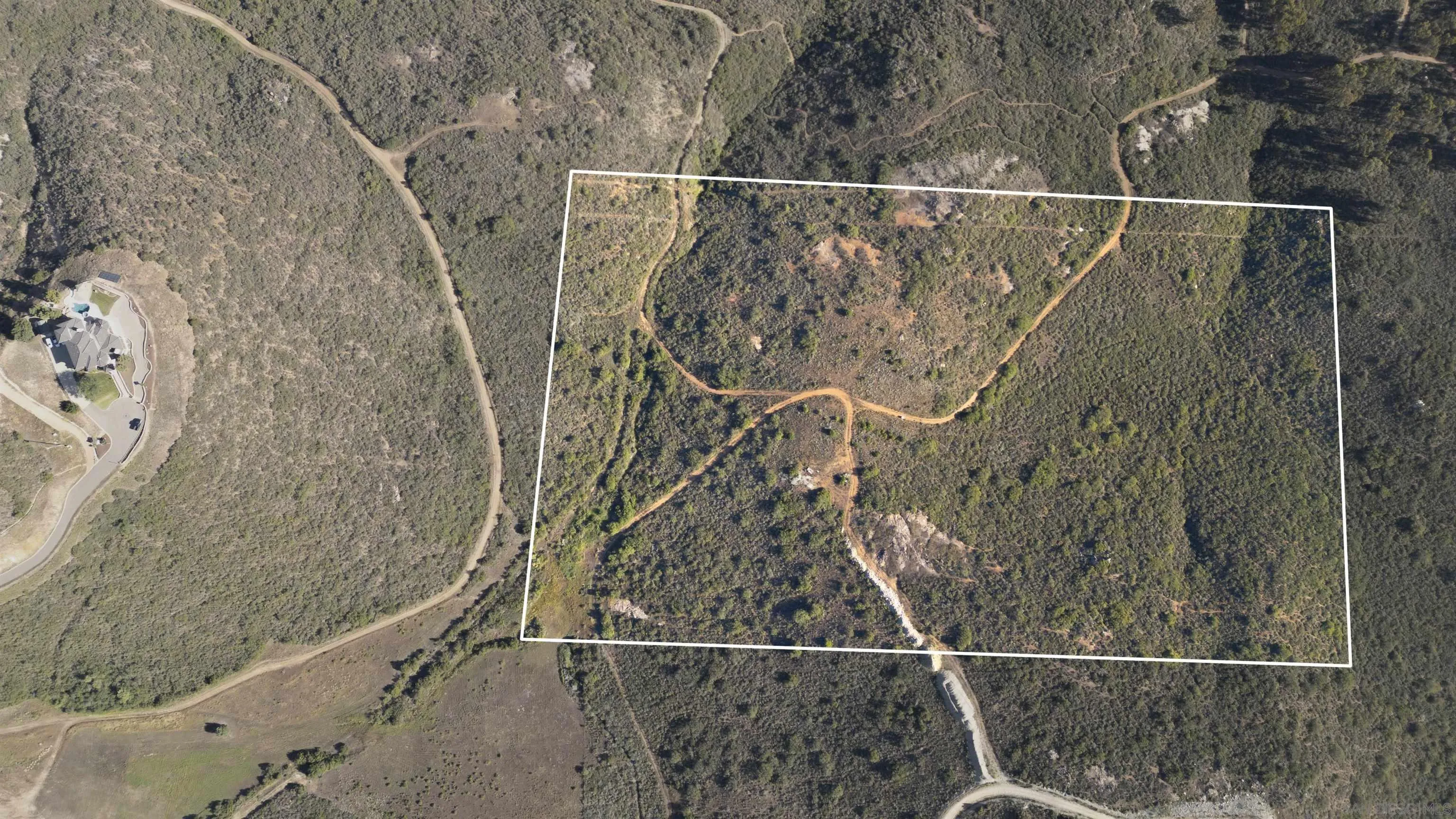 15095 Misty Meadow Road Poway, CA 92064 - Photo 3 of 15 a bathroom with a shower and a mirror