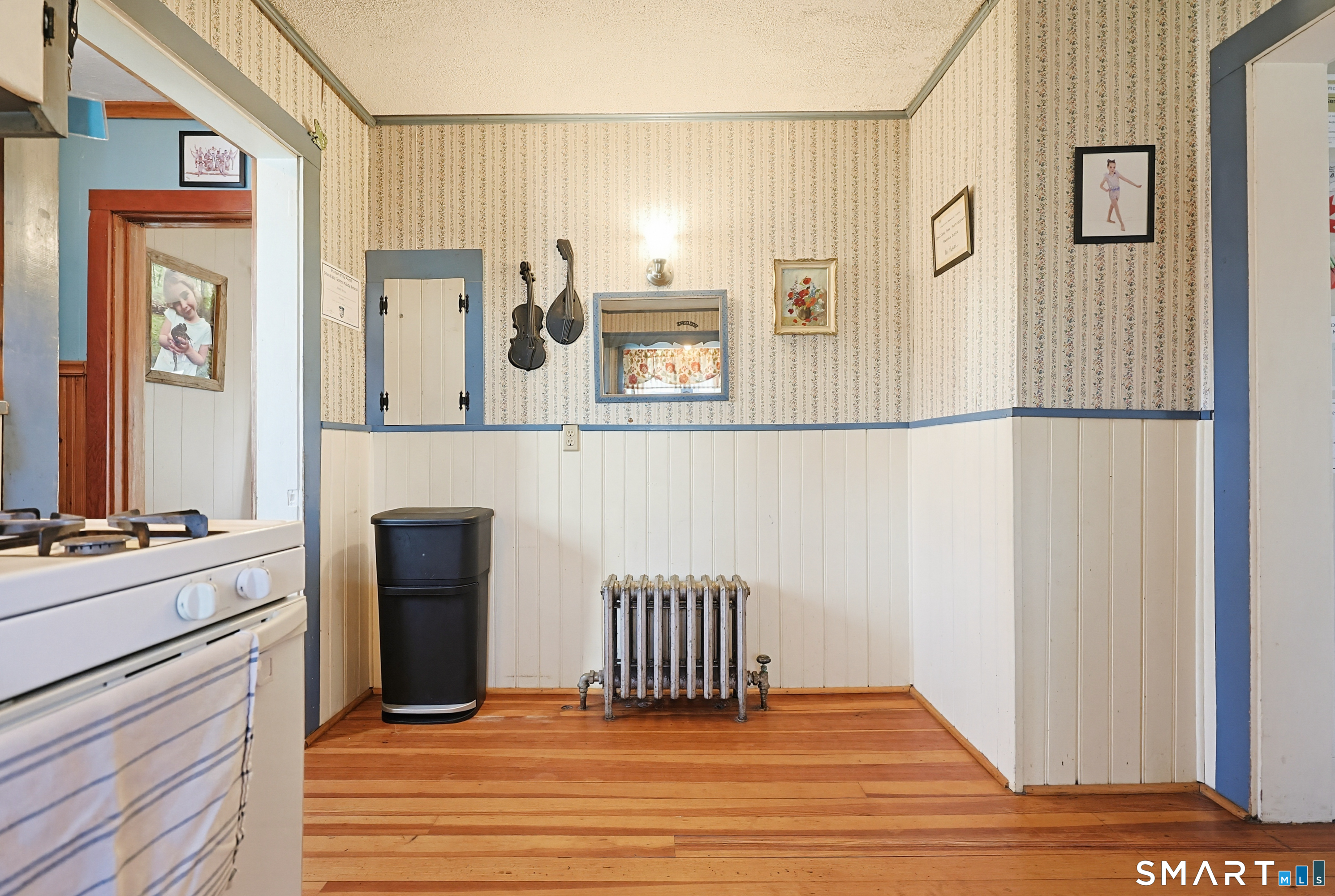 19 Church Street Plainfield, CT 06374 - Photo 12 of 39 a view of a hallway with front door and wooden floor