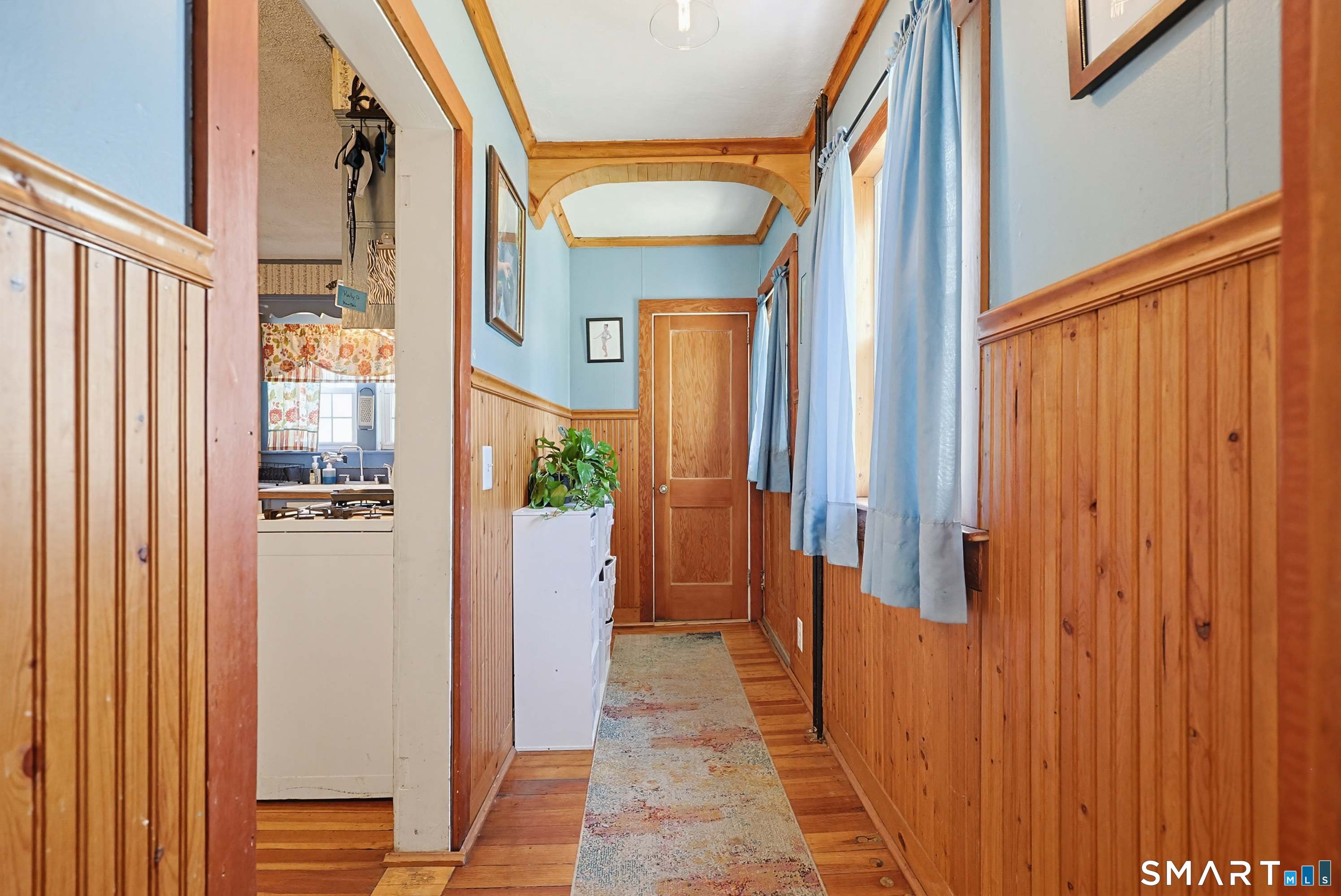19 Church Street Plainfield, CT 06374 - Photo 16 of 39 a view of a hallway with a door and stairs