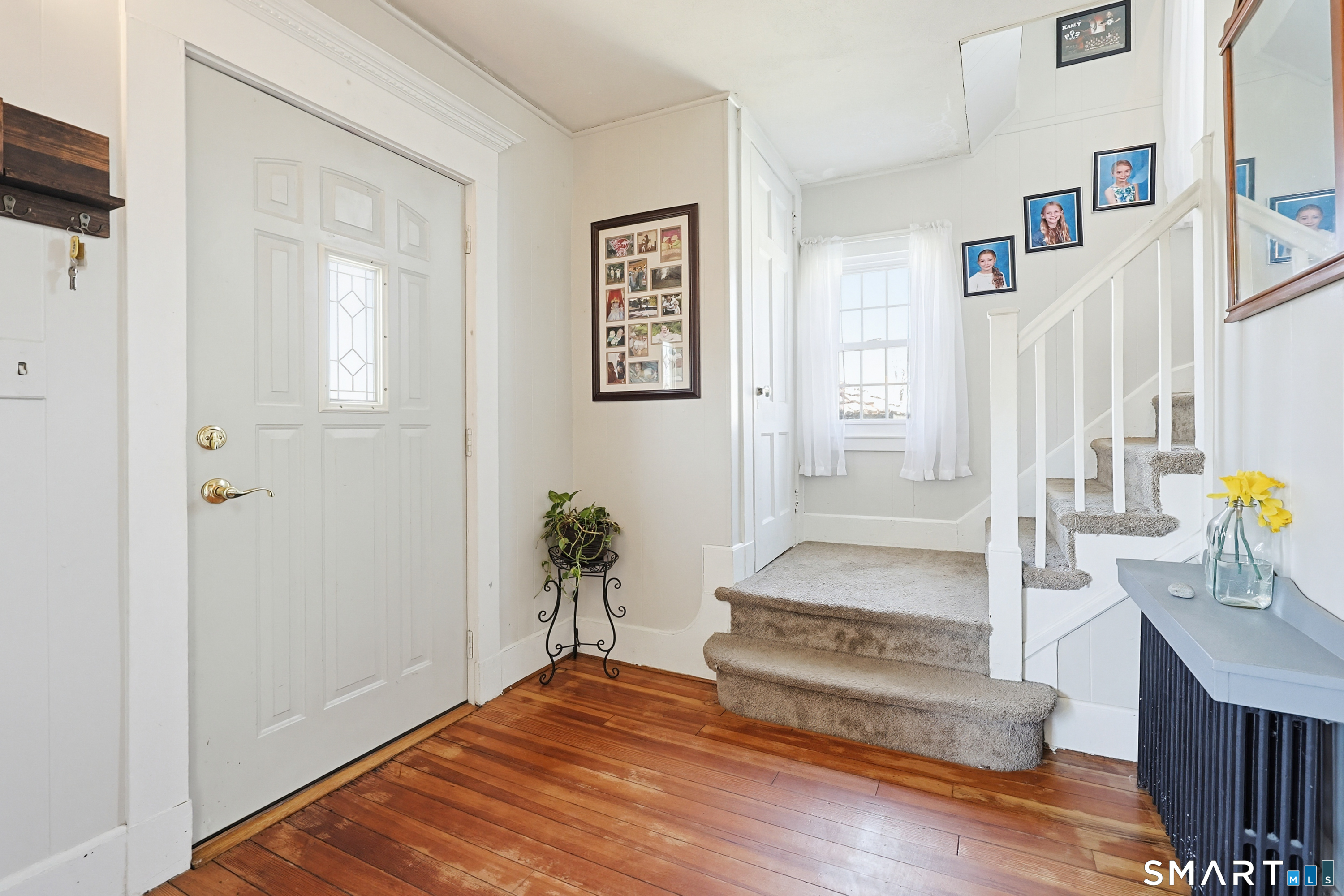 19 Church Street Plainfield, CT 06374 - Photo 18 of 39 a view of an entryway with wooden floor and door
