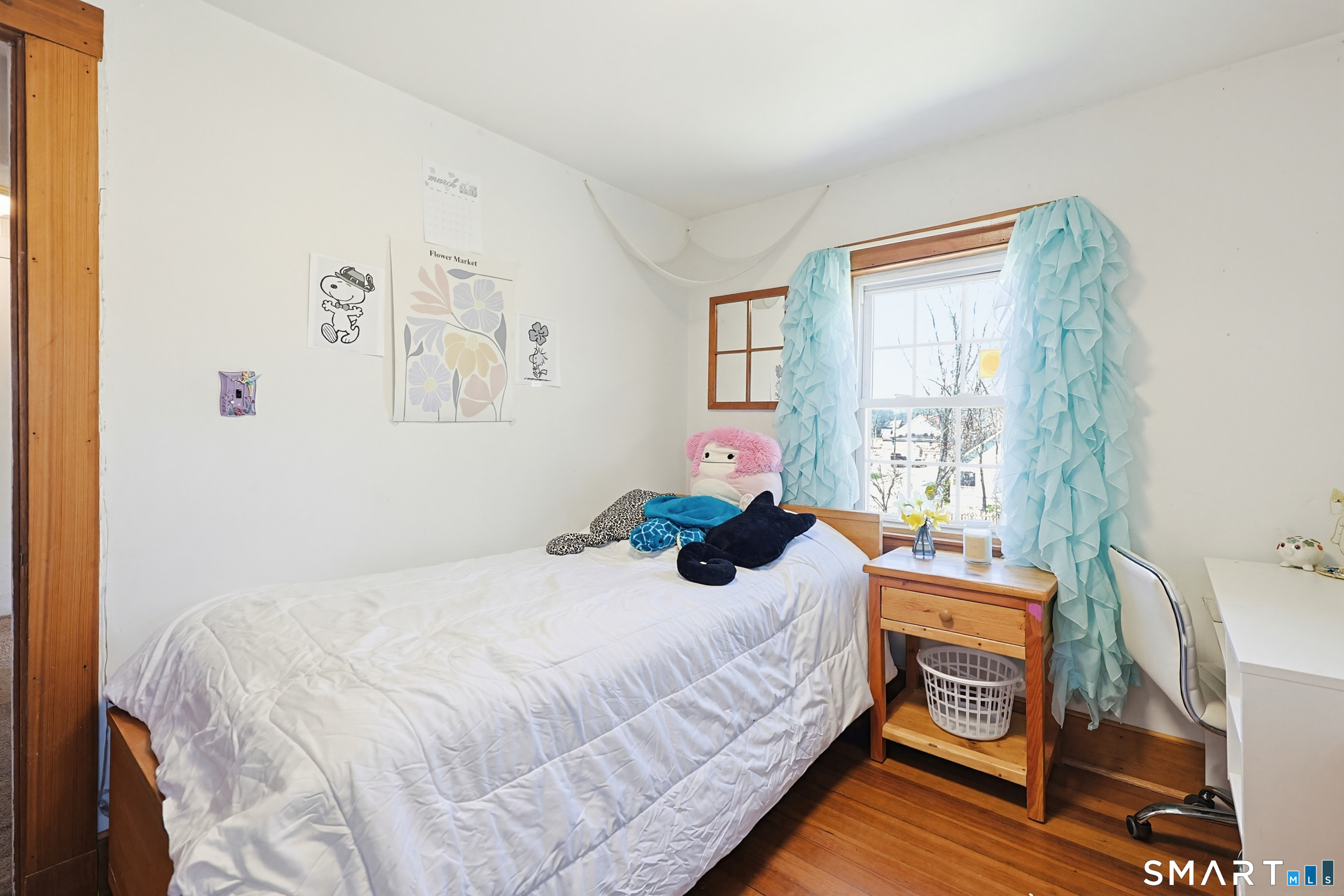 19 Church Street Plainfield, CT 06374 - Photo 20 of 39 a bedroom with a bed and a window