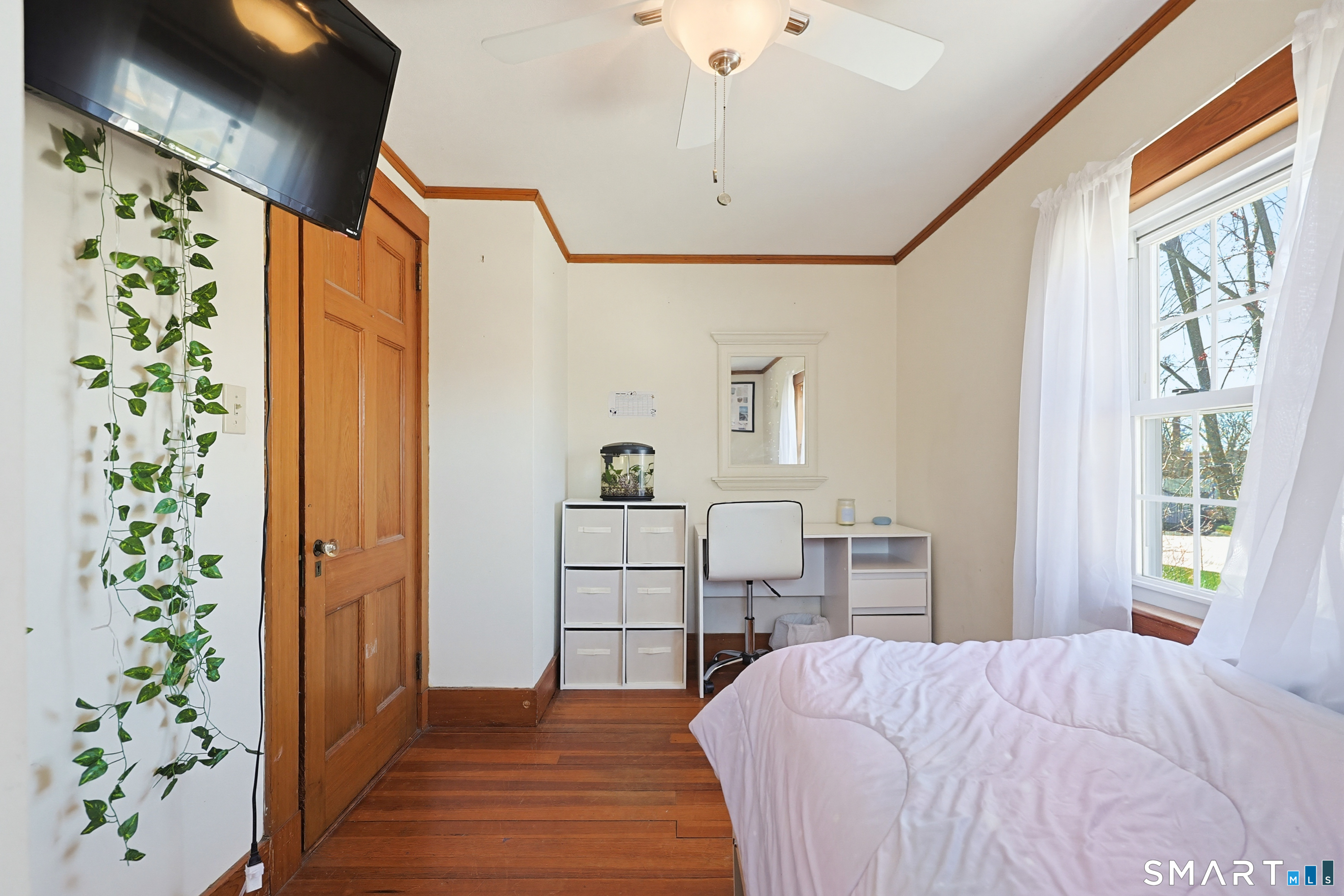 19 Church Street Plainfield, CT 06374 - Photo 26 of 39 a bedroom with a bed and a window