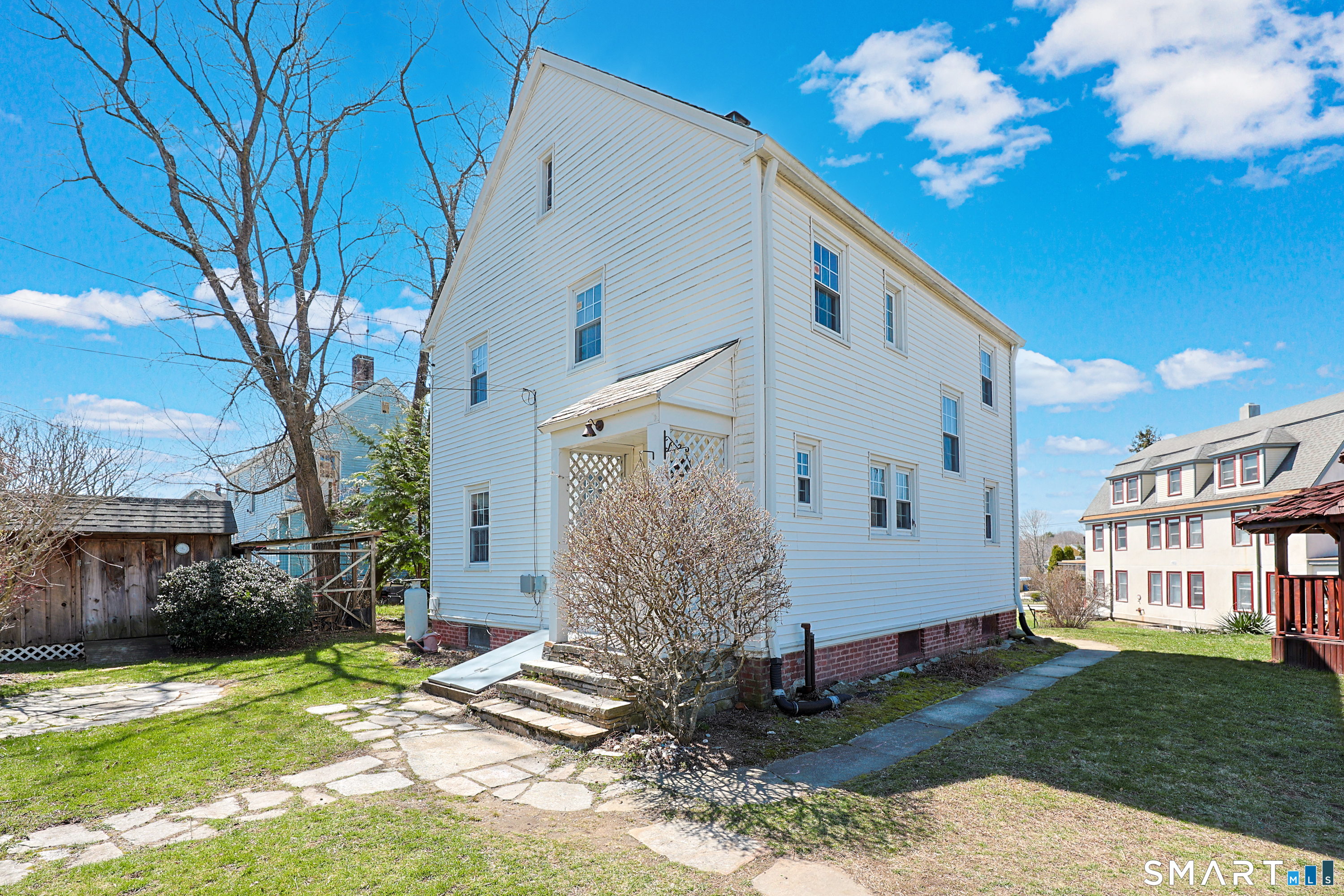 19 Church Street Plainfield, CT 06374 - Photo 36 of 39 a view of a house with backyard and sitting area