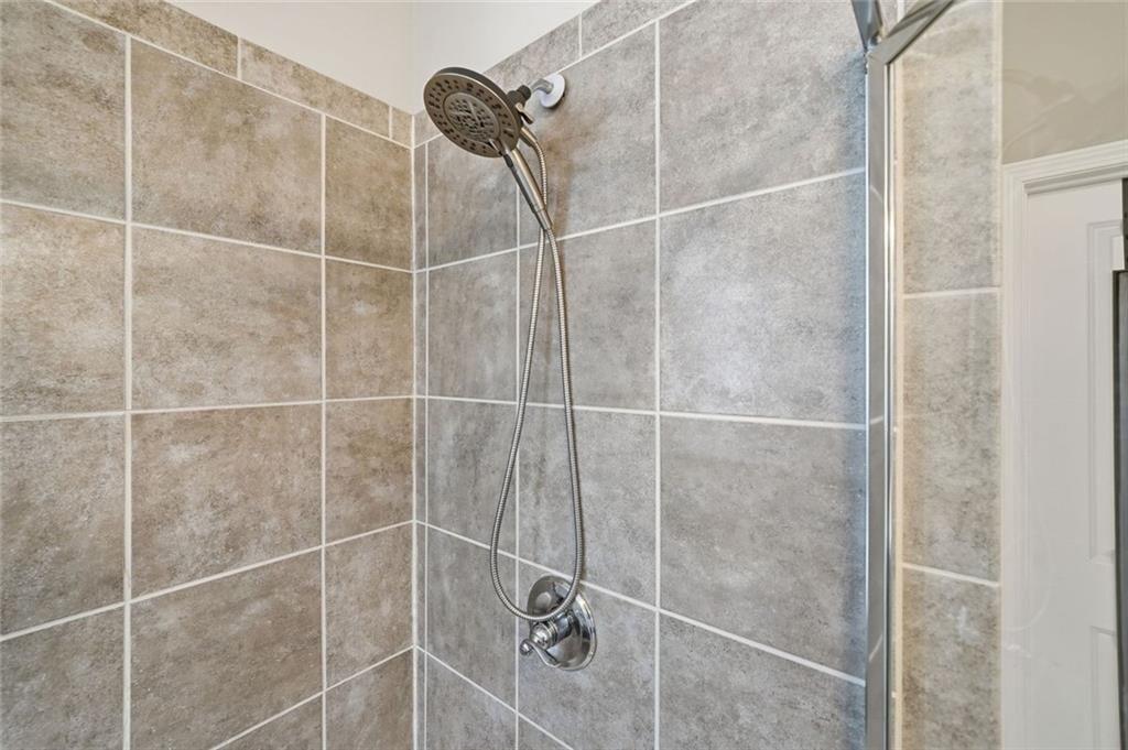 123 Longleaf Drive Canton, GA 30114 - Photo 21 of 39 a bathroom with a shower