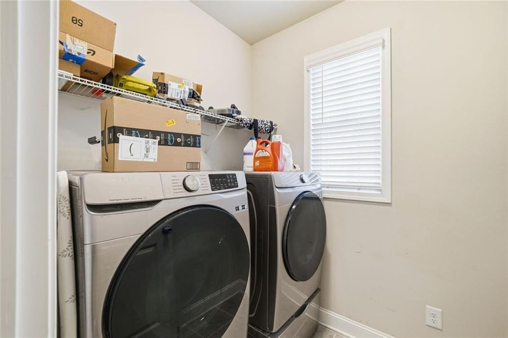 123 Longleaf Drive Canton, GA 30114 - Photo 28 of 39 a utility room with dryer and washer