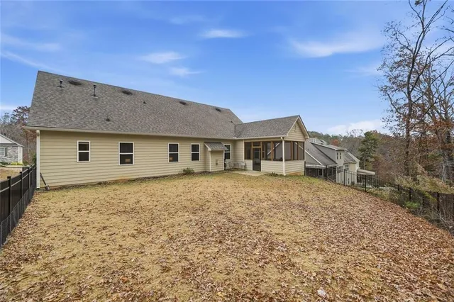 a house with trees in the background