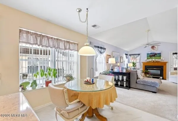 a bedroom with furniture and a chandelier