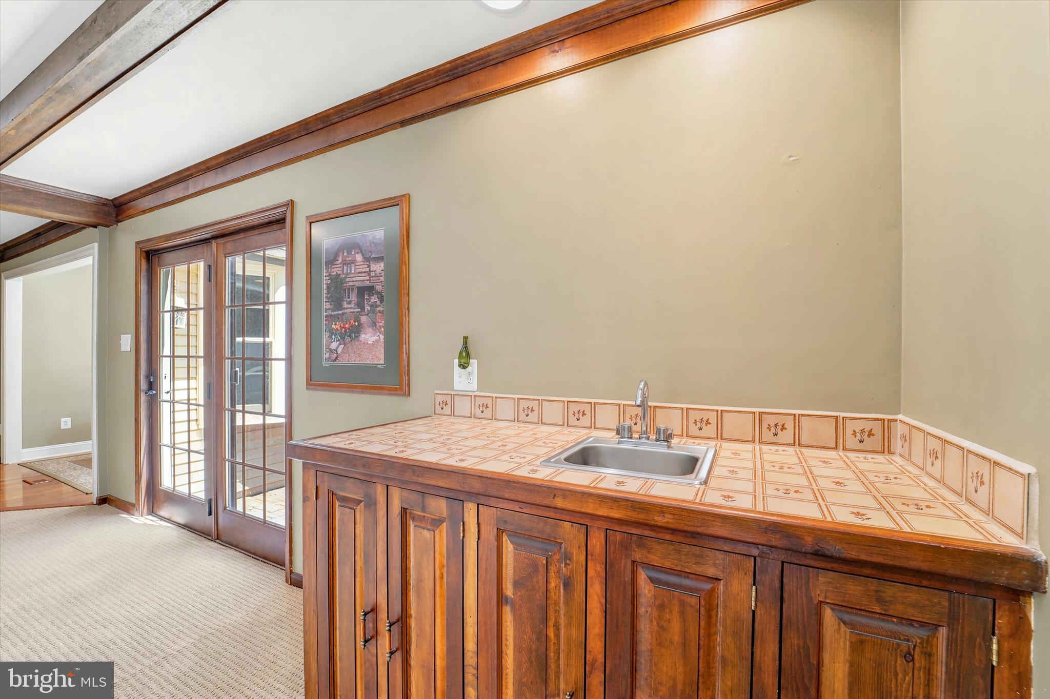 1980 Terwood Road Huntingdon Valley, PA 19006 - Photo 13 of 48 a bathroom with a sink and a mirror