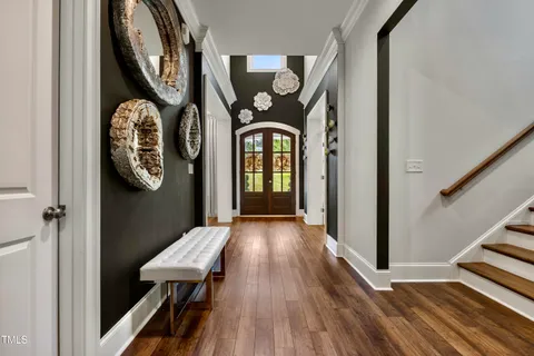 a workspace with furniture window and wooden floor