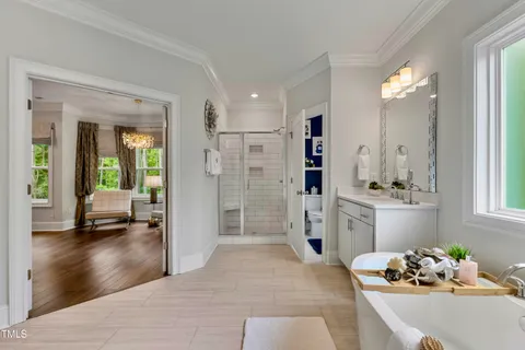 a bedroom with bed and a window