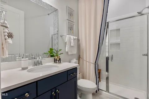 a balcony view with a seating space