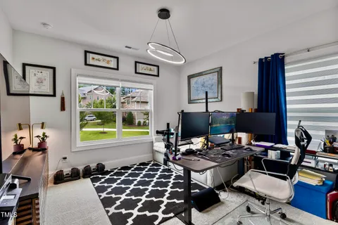 a view of front of house with a yard