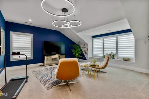 an aerial view of multiple house with yard