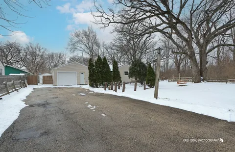 a view of white house with a snow