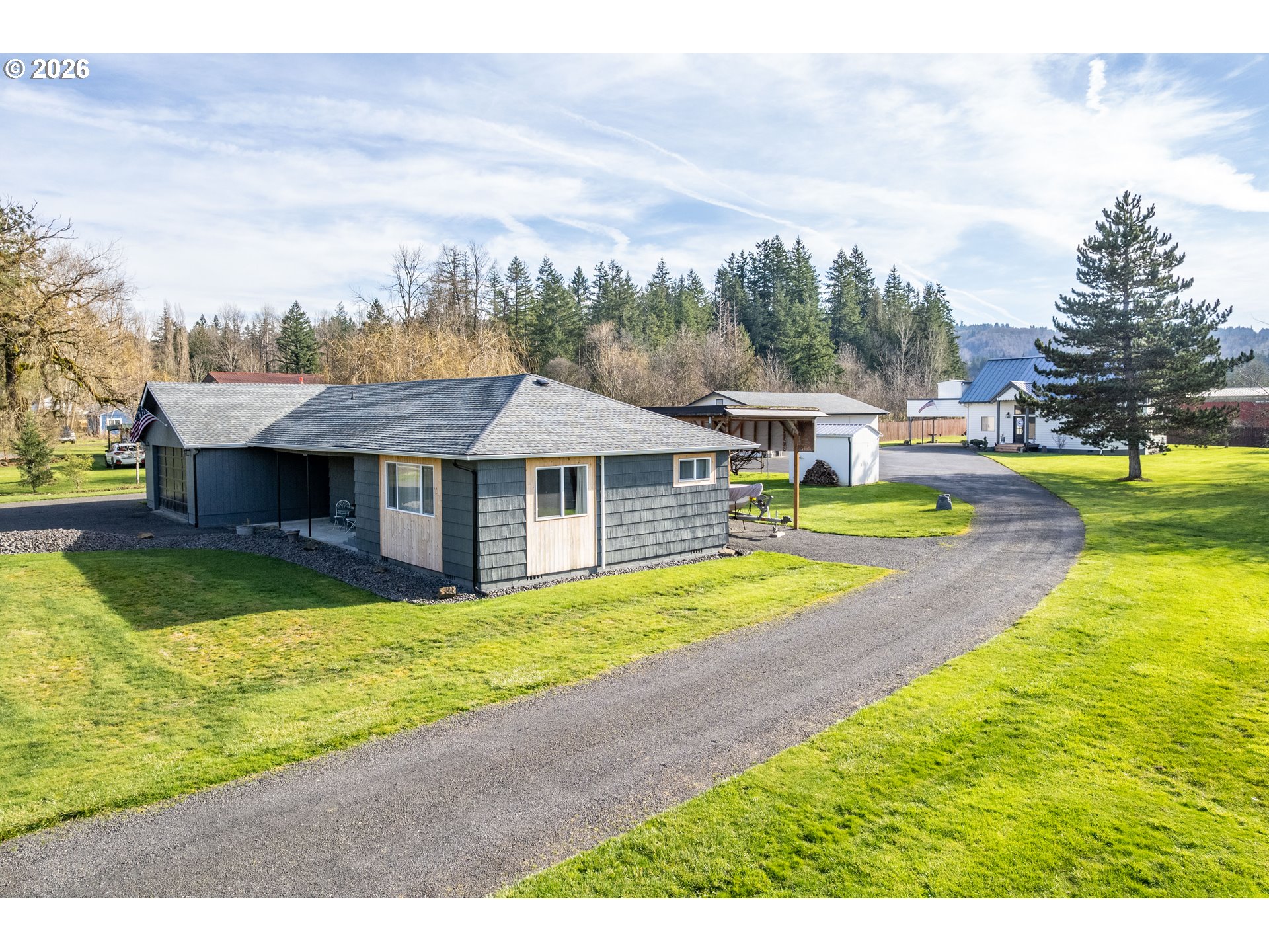 1239 Rose Valley Road Kelso, WA 98626 - Photo 1 of 48 a view of a house with swimming pool and sitting area