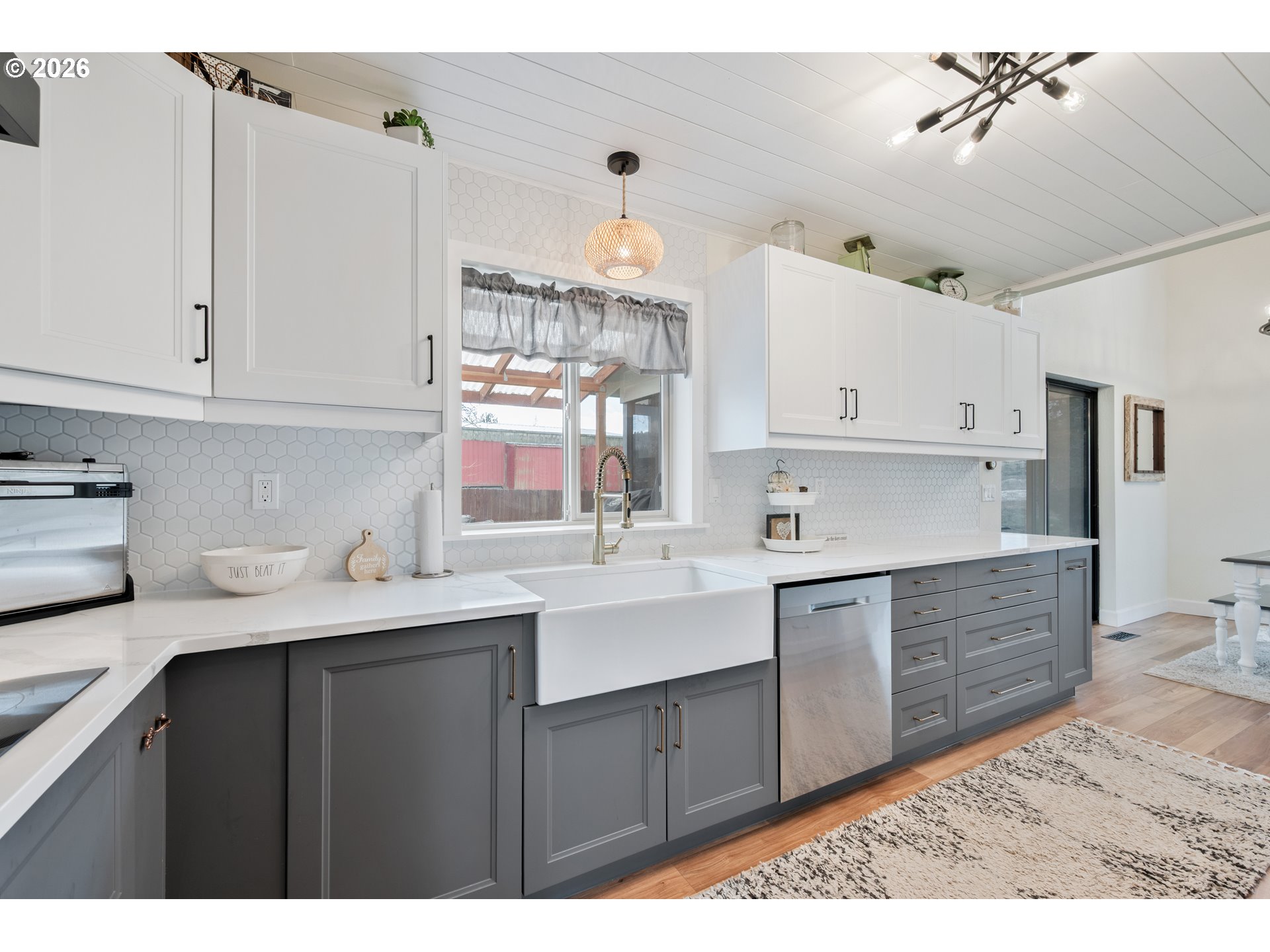 1239 Rose Valley Road Kelso, WA 98626 - Photo 15 of 48 a kitchen with kitchen island sink stove and cabinets