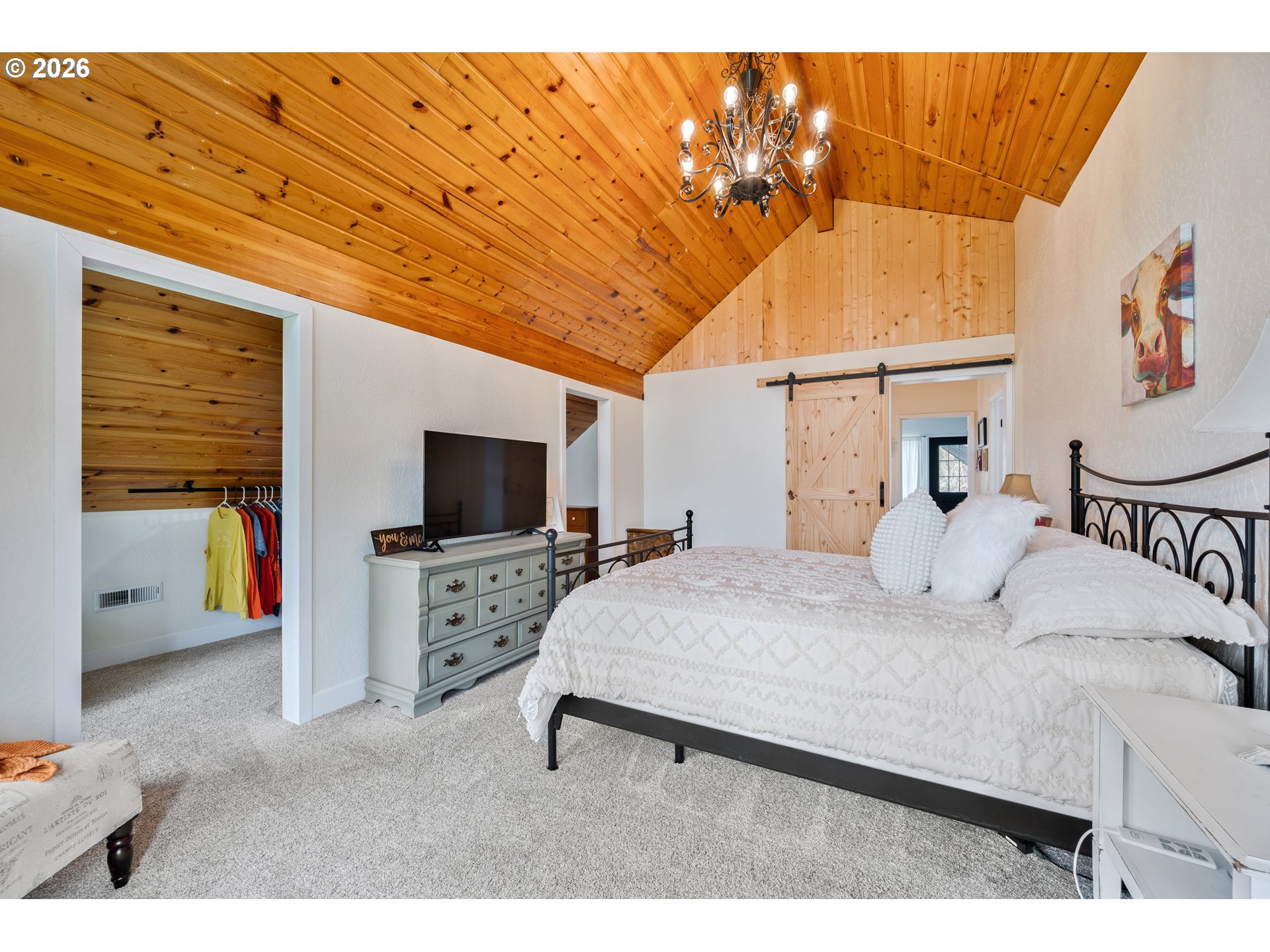 1239 Rose Valley Road Kelso, WA 98626 - Photo 24 of 48 a bedroom with a bed and a flat screen tv