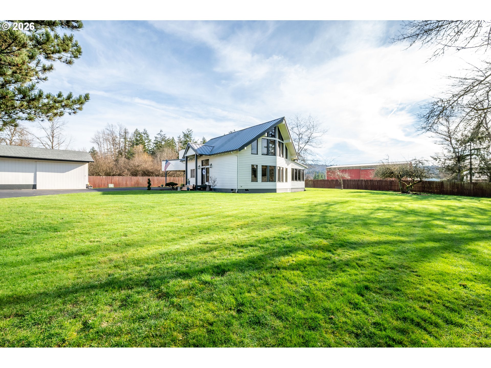 1239 Rose Valley Road Kelso, WA 98626 - Photo 40 of 48 a view of a house with a yard and sitting area