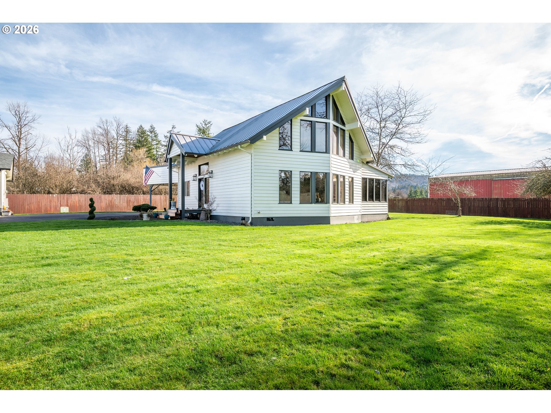 1239 Rose Valley Road Kelso, WA 98626 - Photo 4 of 48 a view of a house with a yard and sitting area