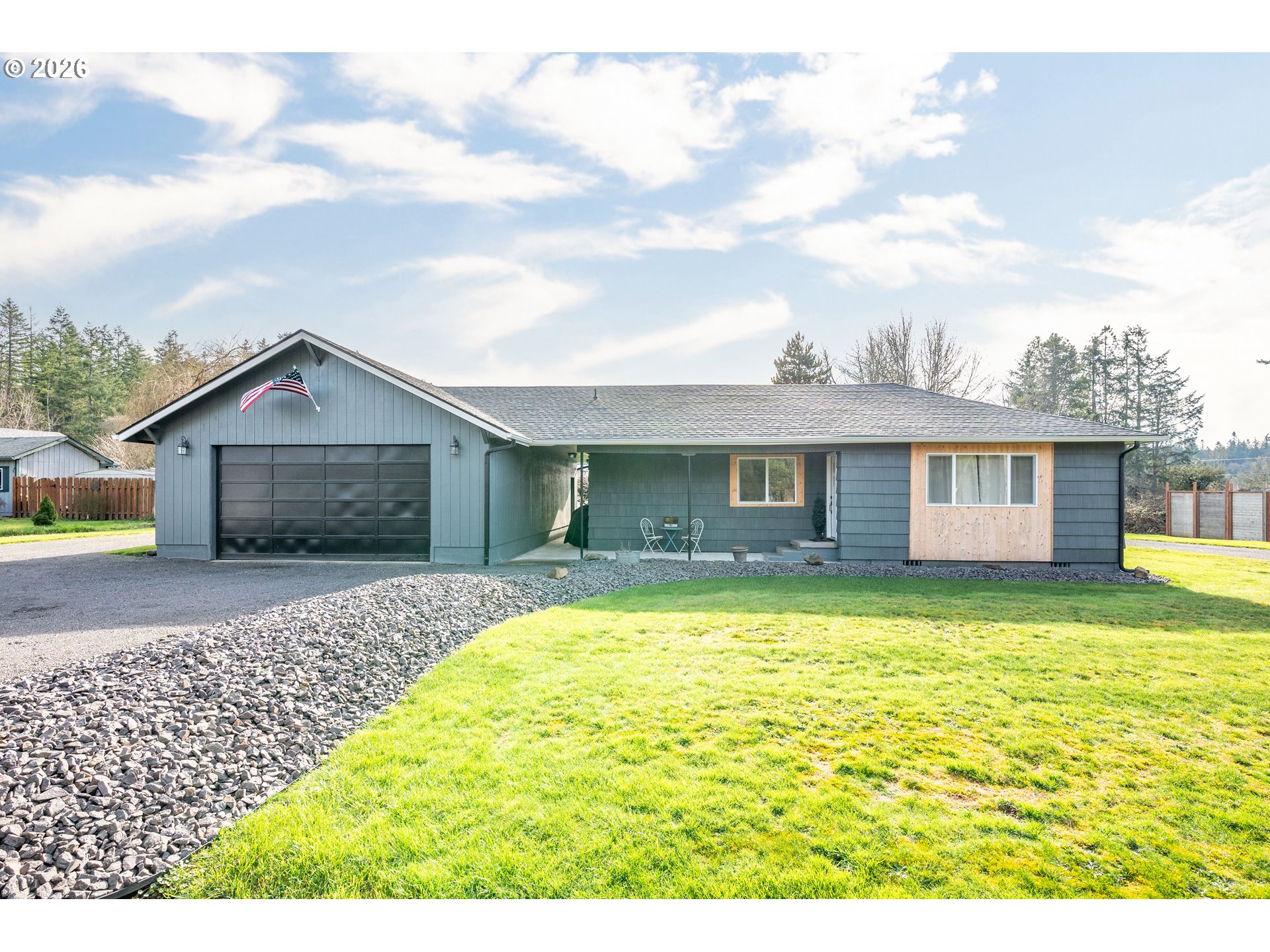 1239 Rose Valley Road Kelso, WA 98626 - Photo 5 of 48 a front view of a house with a yard
