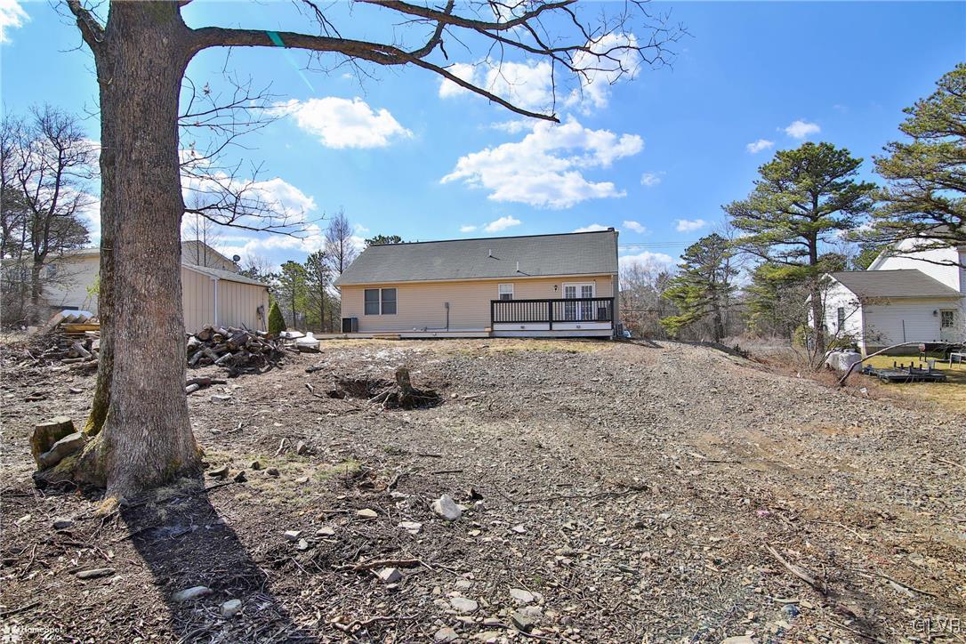 1646 Clover Road Long Pond, PA 18334 - Photo 31 of 31 a view of a house with a backyard