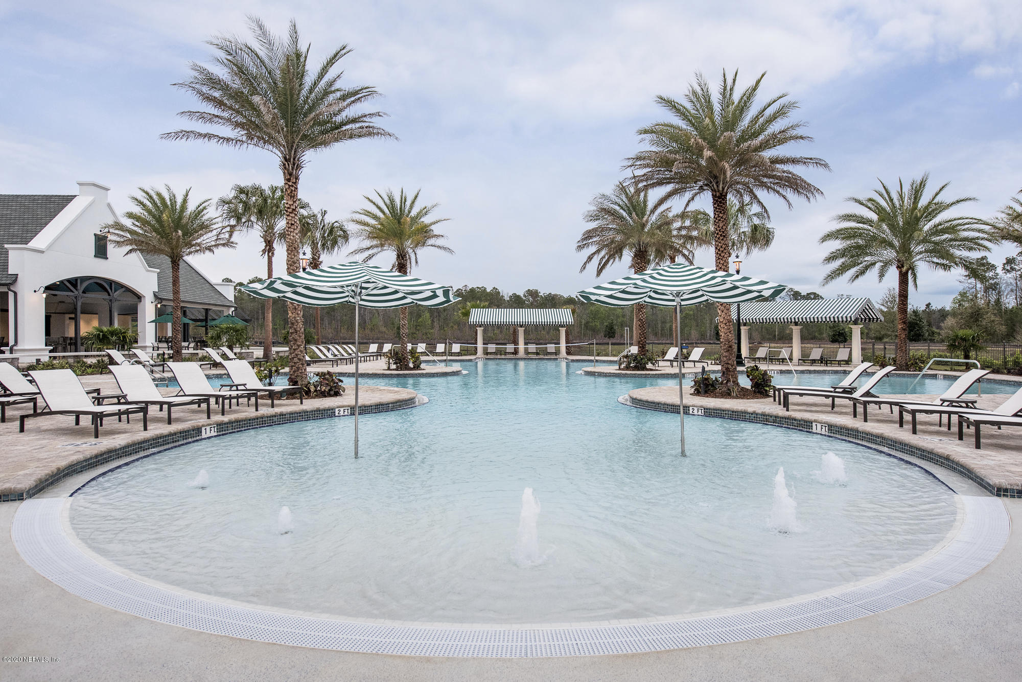 51 Seamount Way St. Augustine, FL 32092 - Photo 18 of 24 a view of a swimming pool with chairs