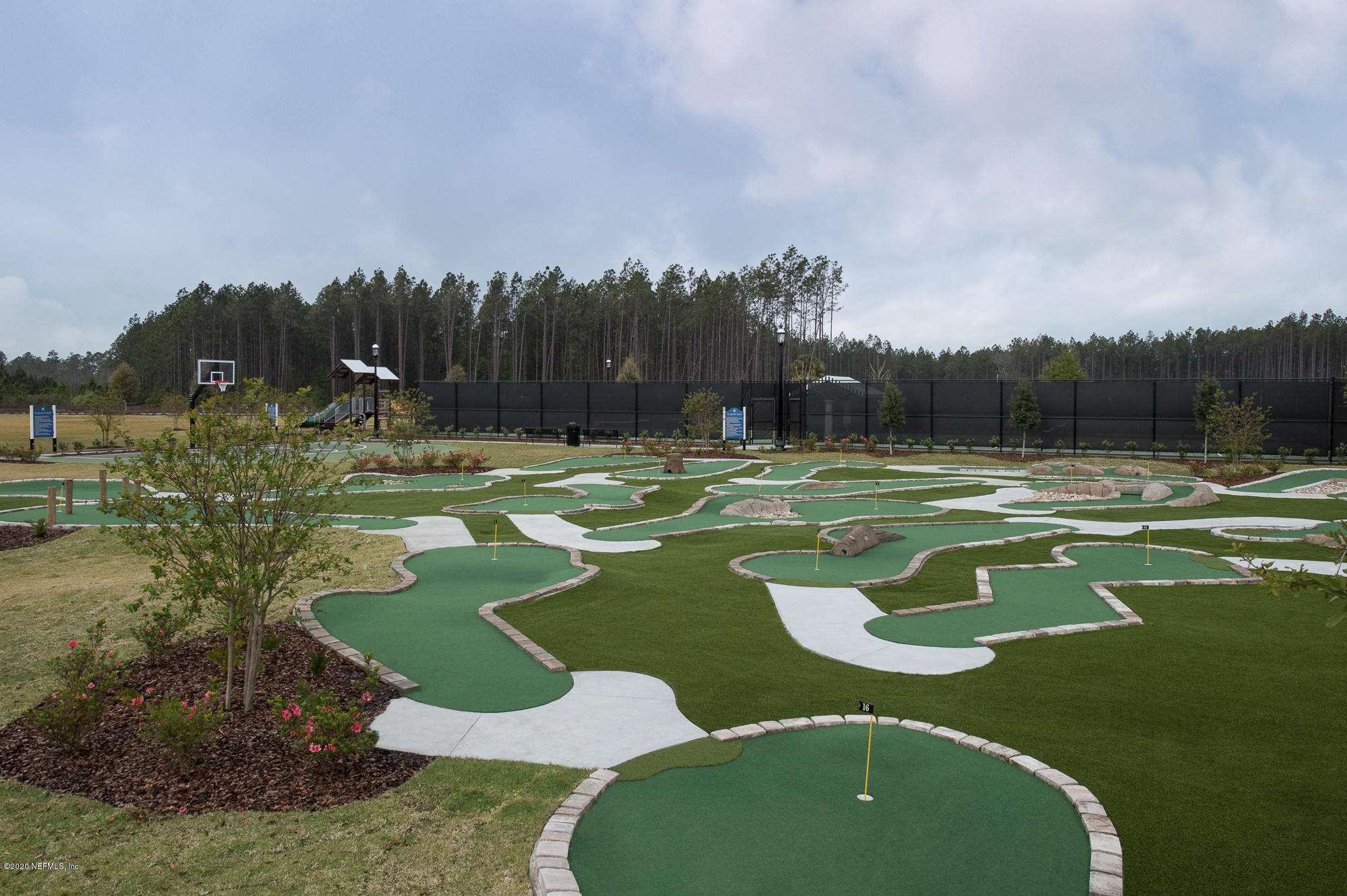 51 Seamount Way St. Augustine, FL 32092 - Photo 9 of 24 a view of a golf course with a lake