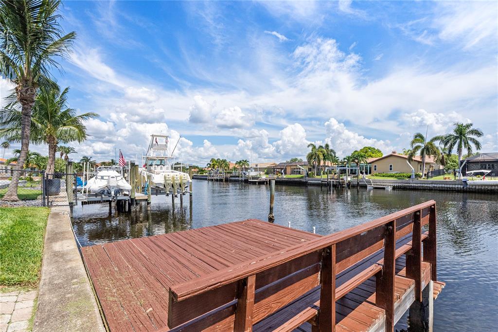2044 Montana Avenue Northeast St. Petersburg, FL 33703 - Photo 15 of 53 a view of a lake with house