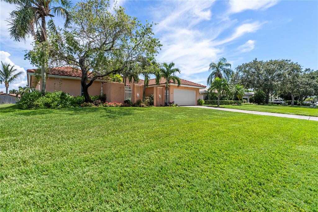 2044 Montana Avenue Northeast St. Petersburg, FL 33703 - Photo 32 of 53 a view of a house with a yard