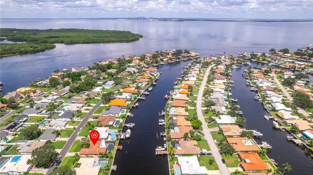 a view of a patio with a yard
