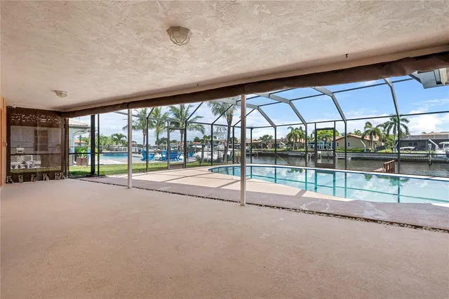 a view of a swimming pool with a porch