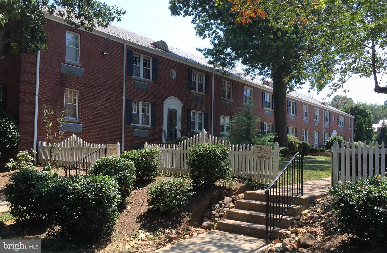 11 West Glebe Road, Unit C Alexandria, VA 22305 - Photo 22 of 29 a front view of a house with a garden