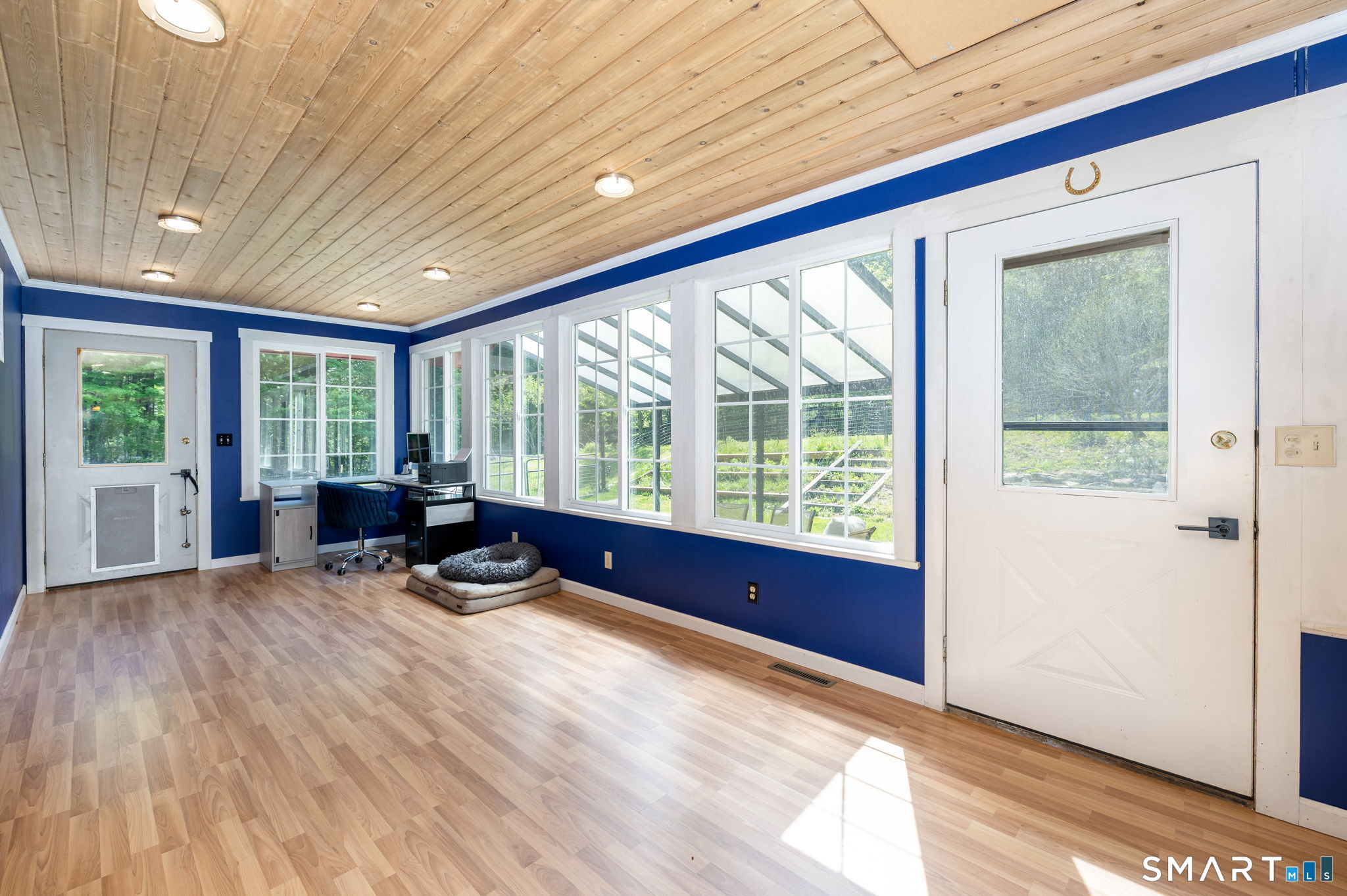 250 Center Hill Road Barkhamsted, CT 06063 - Photo 8 of 40 a view of a room with chair and wooden floor