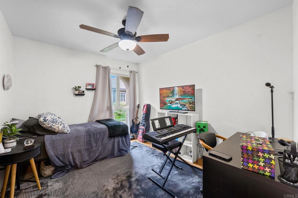 3470 Peach Tree Way Oceanside, CA 92058 - Photo 12 of 21 a living room with furniture and a rug