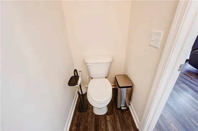 a bathroom with a toilet and a sink