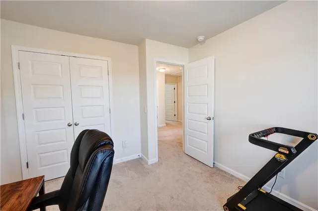 a view of livingroom with furniture and entryway