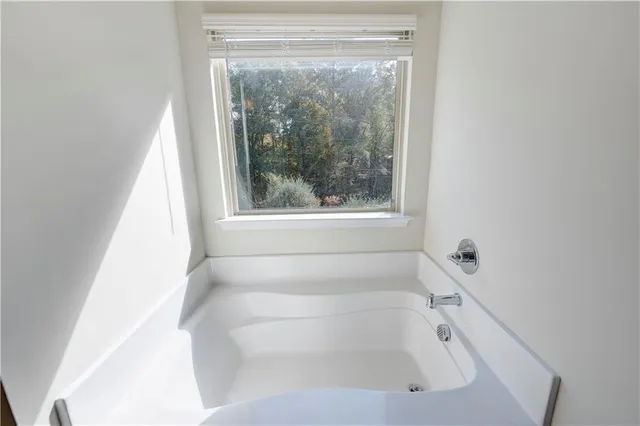 a bathroom with a bathtub
