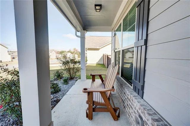 an aerial view of a house with a garden