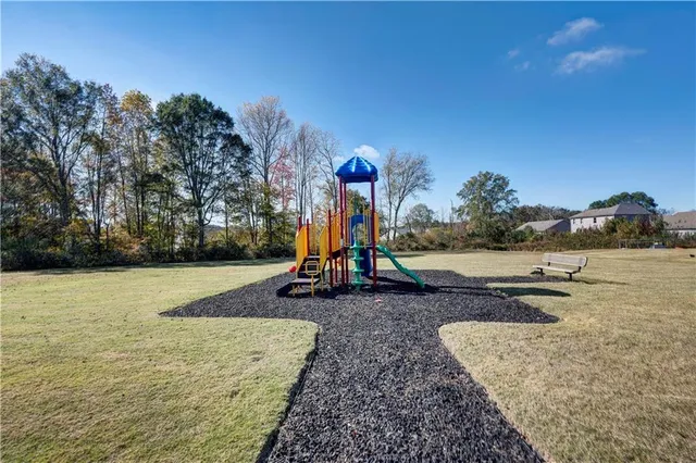 a view of a house with a sink and wooden floor