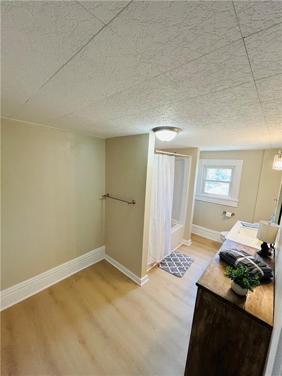 103 Memorial Street Dunbar, PA 15431 - Photo 17 of 29 a bedroom with a bed and a window in it