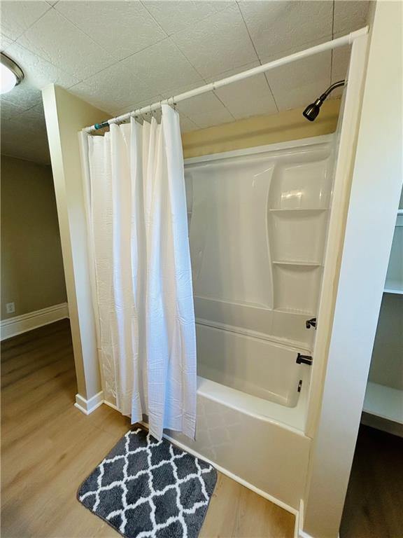 103 Memorial Street Dunbar, PA 15431 - Photo 19 of 29 a bathroom with a window and a shower