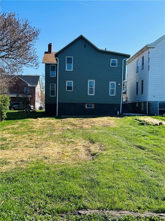103 Memorial Street Dunbar, PA 15431 - Photo 27 of 29 a house view with a sitting space and garden