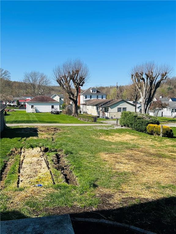 103 Memorial Street Dunbar, PA 15431 - Photo 29 of 29 a view of swimming pool with a yard and outdoor seating