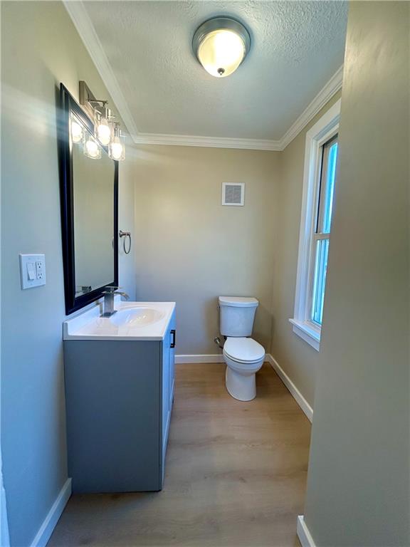103 Memorial Street Dunbar, PA 15431 - Photo 7 of 29 a bathroom with a sink mirror and toilet