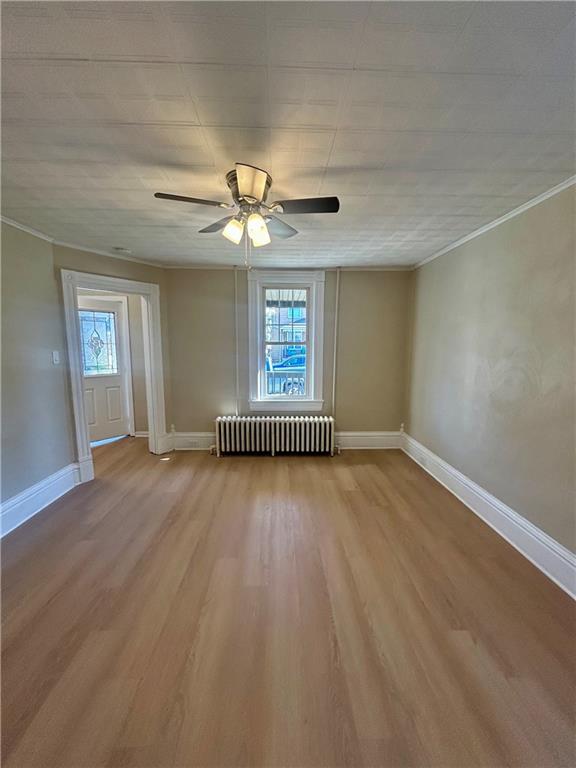 103 Memorial Street Dunbar, PA 15431 - Photo 9 of 29 wooden floor in an empty room with a window