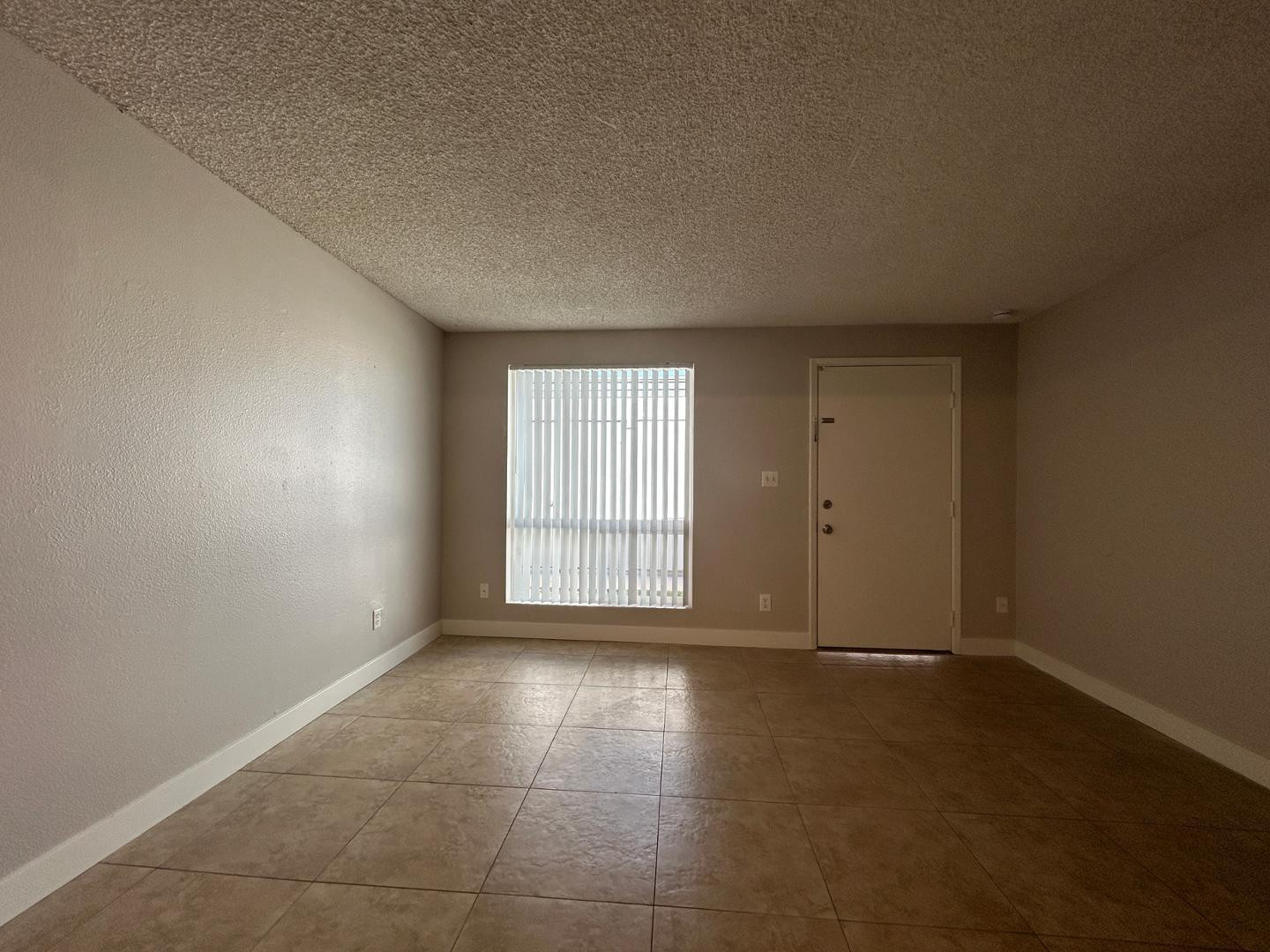 859 South Ext Road Mesa, AZ 85210 - Photo 9 of 19 an empty room with windows
