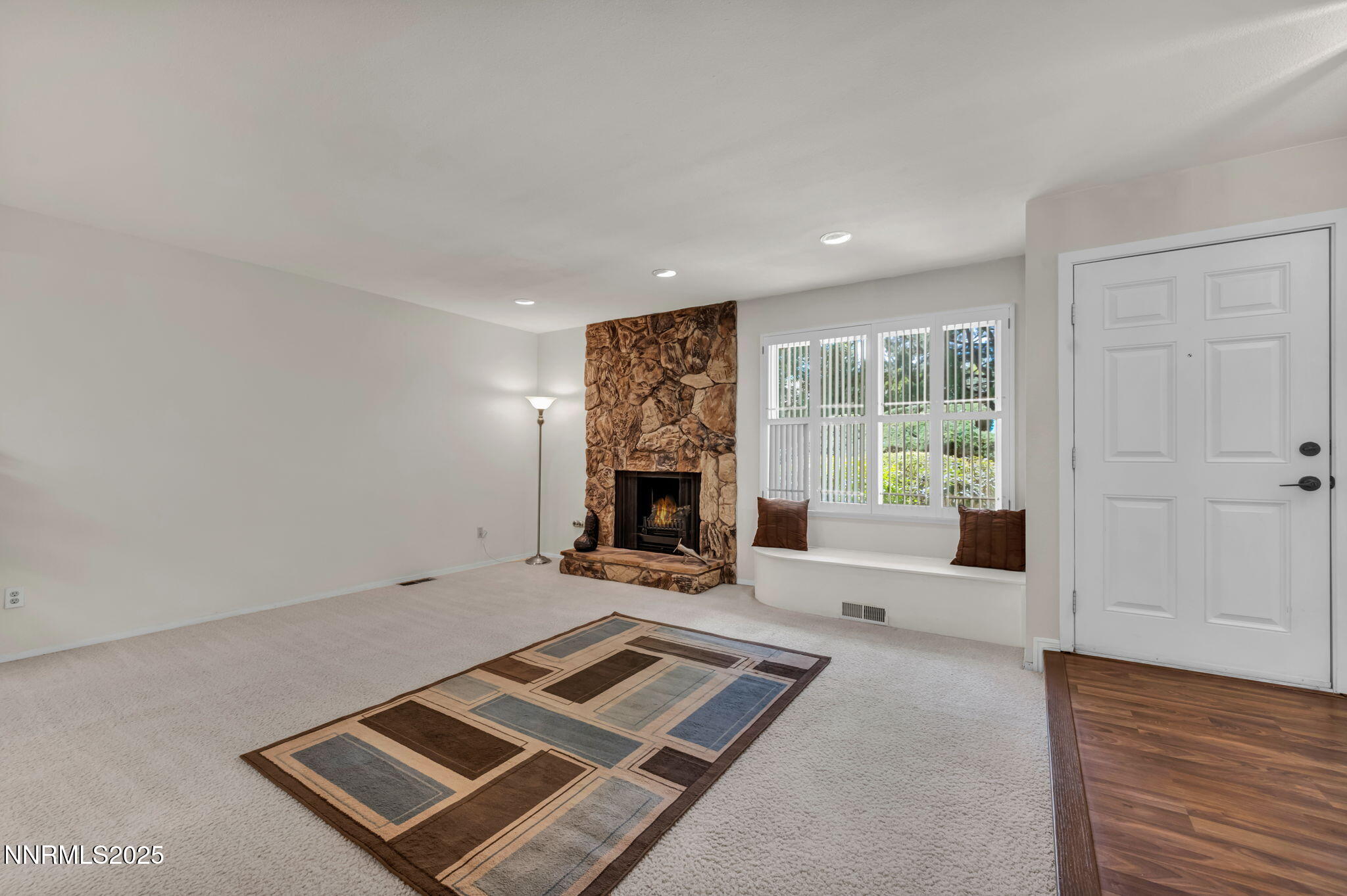 1481 Foster Drive Reno, NV 89509 - Photo 13 of 52 a living room with furniture and a fireplace